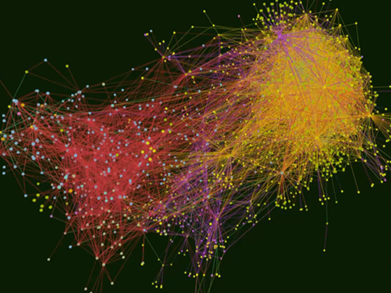 Visualisierung eines Wissensgraphen mit farbigen Knoten und Verbindungen, die komplexe Beziehungen und Netzwerke zwischen Daten darstellen.